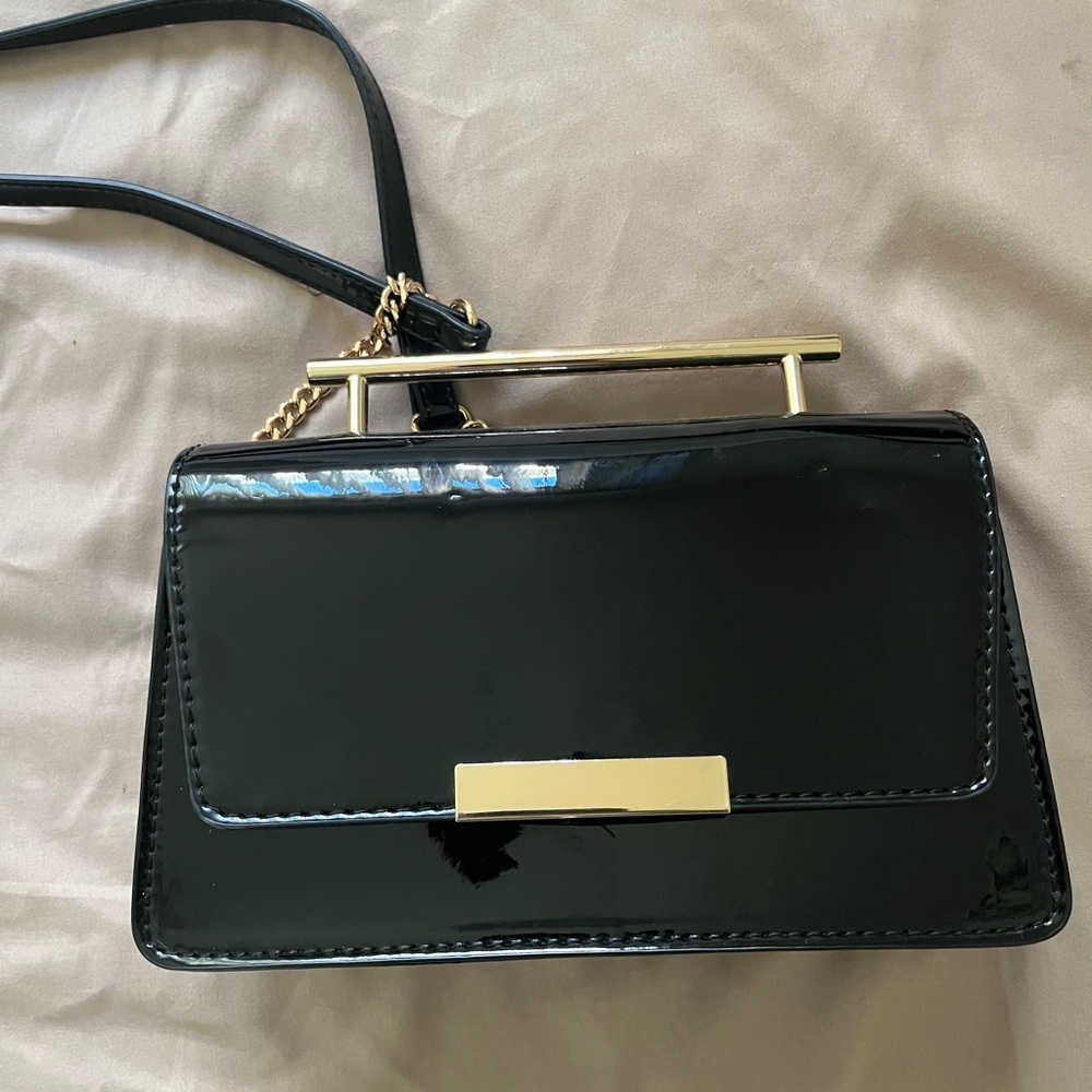 Elegant Black Clutch with Gold Accents